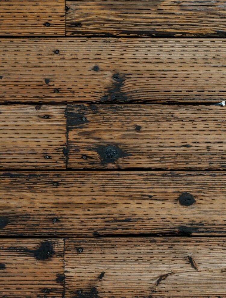Reclaimed plank floor with original nail holes Reclaimed plank floor with original nail holes