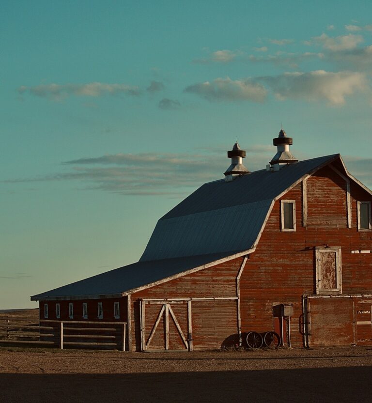 Red barn under a clear sky