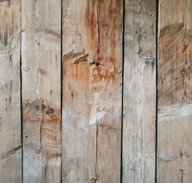 Sun-silvered weathered barn boards