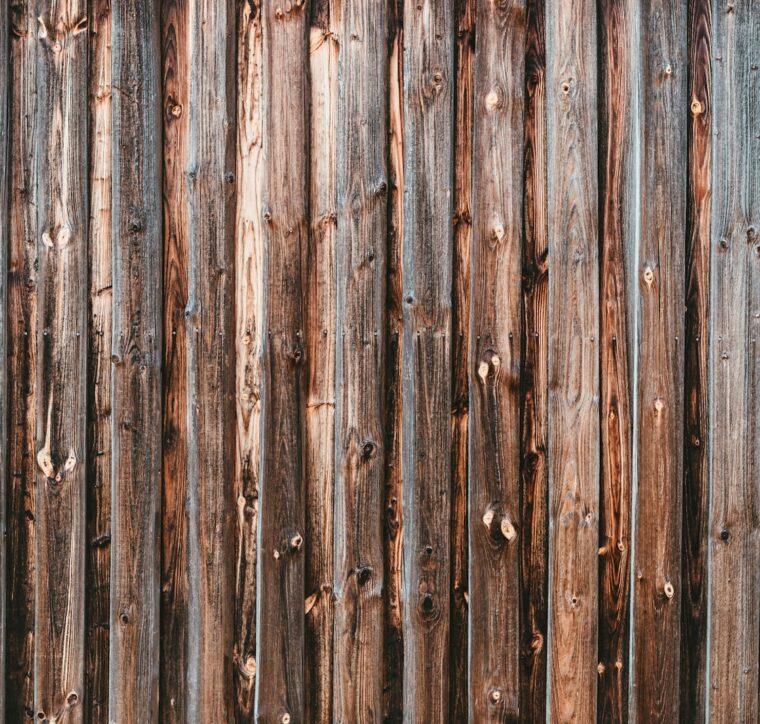 Weathered brown and grey barnwood boards