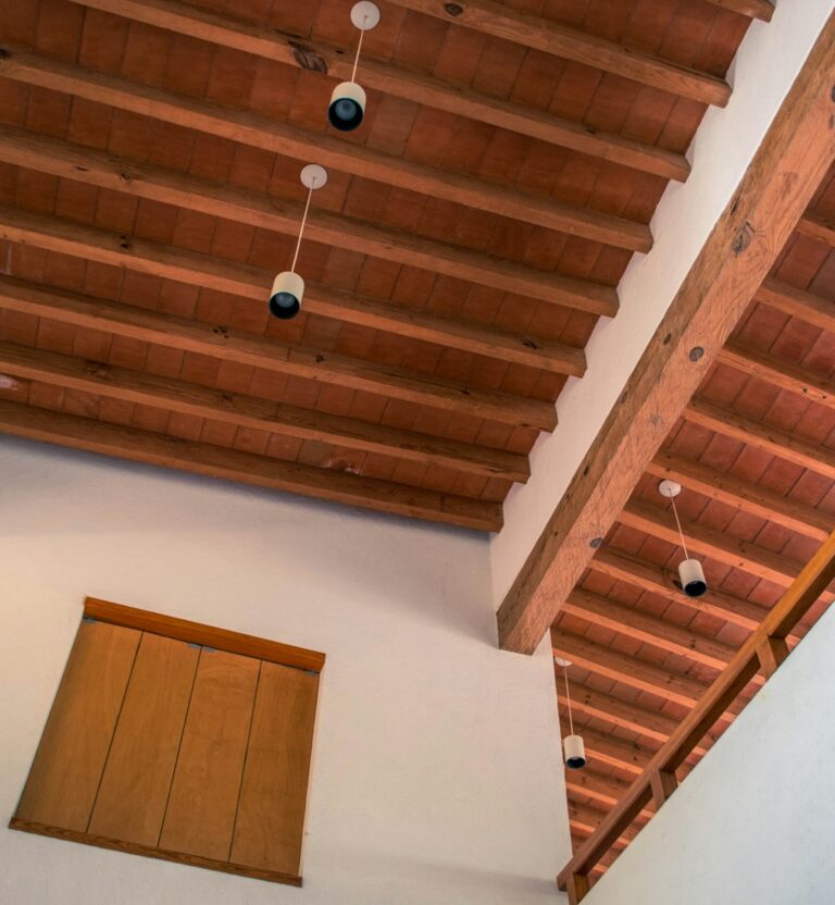 Wood ceiling with a pendant lamp