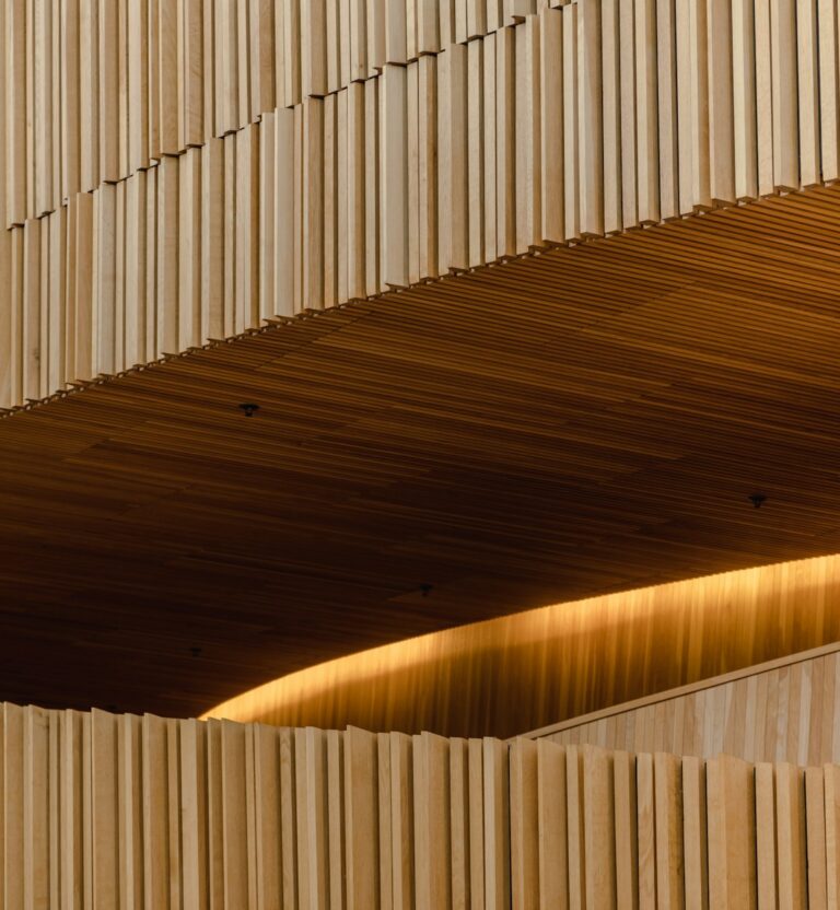 Wood slat ceiling with a cove light